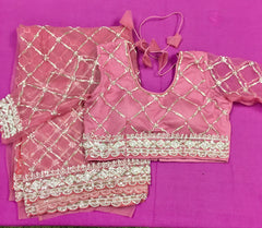 AFL3070 Partywear net saree in pink with silver bead and sequin embroidery.Comes with stitched blouse size 40,can be altered to 44 size.Fall peco done.