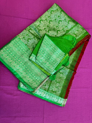 Banarasi Tussari saree in Red with Green  border.Fall peco done. Comes with stitched blouse size 38 can be altered up to 44 size.