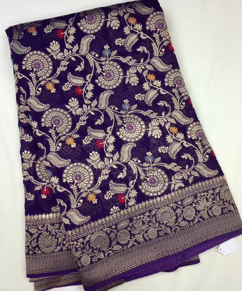 BKS103 Banarasi Georgette saree in purple.Comes with stitched blouse size 38 can be altered to size 42. Fall peco done.