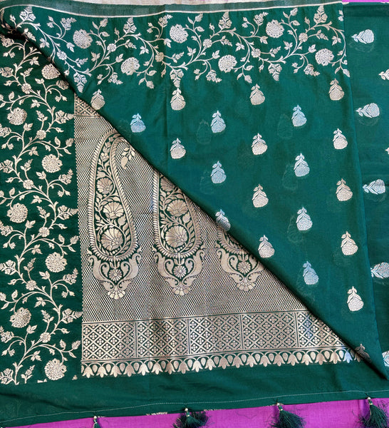 semi silk banarasi Saree in Bottle Green with Gold Zari Border. Fall peco done. Comes  with stitched blouse size 38 can be altered up to 44