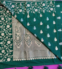 semi silk banarasi Saree in Bottle Green with Gold Zari Border. Fall peco done. Comes  with stitched blouse size 38 can be altered up to 44