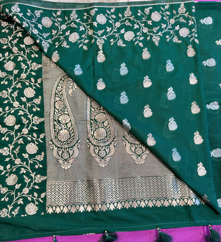 semi silk banarasi Saree in Bottle Green with Gold Zari Border.Fall peco done. Comess  with stitched blouse size 38 can be altered up to 44