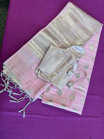 Semi Raw mango Saree in pink with Silver  Zari Border.Fall peco done. Comess with stitched blouse size 38 can be altered up to 44