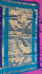 Semi kanjivaram soft silk Saree in Dark blue with light blue border. Fall peco done. Comes with stitched blouse size 38 can be altered up to 44 size.
