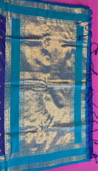 Semi kanjivaram soft silk Saree in Dark blue with light blue border.Fall peco done. Comess with stitched blouse size 38 can be altered up to 44 size.