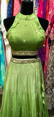 AFL9036 lehenga in green . Comes with matching stitched blouse and dupatta.