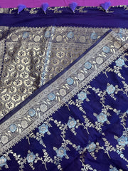 Banarasi Tussari georgette saree in Blue with gold and silver zari border.Fall peco done. Comess with stitched blouse size 38 can be altered up to 44 size.