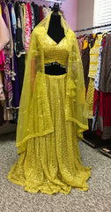 AFL4002 Wedding lehenga in yellow comes with heavy embroidery and sequin work.comes with net dupatta and stitched blouse.