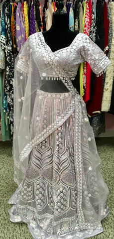 AFL4003 Wedding lehenga in lavender with heavy embroidery and sequin work.comes with stitched blouse and net dupatta.