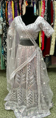AFL4003 Wedding lehenga in lavender with heavy embroidery and sequin work.comes with stitched blouse and net dupatta.