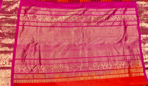 KSS433 Pure handloom kanchipuram silk Saree in orange with pink gold zari border. Comes with stitched blouse size 40