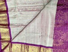 KSS441 Pure handloom kanchipuram silk Saree in pink with purple gold zari border.comes with stitched blouse size 40,can be altered to 44 size.
