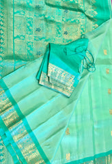 SKH141 PURE GADWAL HANDLOOM SILK SAREE IN PASTEL GREEN WITH TEAL ZARI BORDER AND PALLU