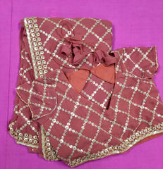AFL3066 Partywear Saree in brown Georgette fabric with silver sequins embroidery.Comes with stitched blouse size 40,can be altered to 44 size.Fall peco done.