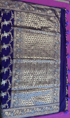 Banarasi Tussari georgette saree in Blue with gold and silver zari border.Fall peco done. Comess with stitched blouse size 38 can be altered up to 44 size.
