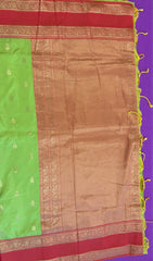 Semi kanjivaram soft silk Saree in Green with Orange border.Fall peco done. Comess with stitched blouse size 38 can be altered up to 44 size.