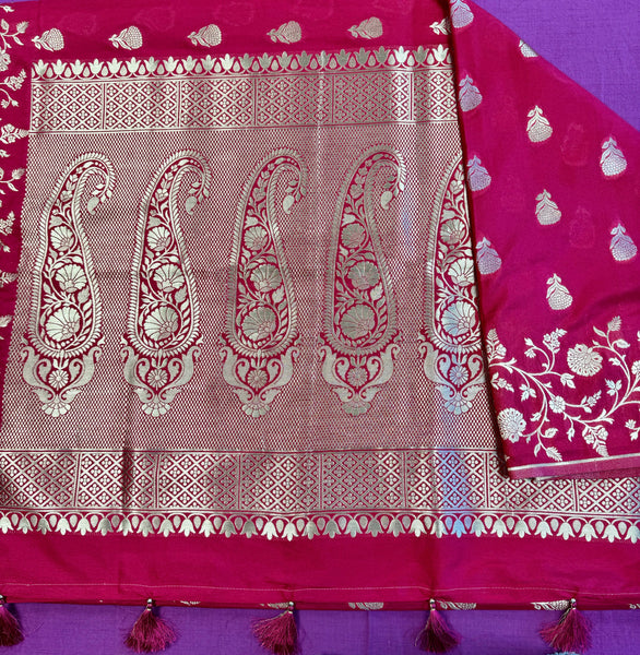 semi silk banarasi Saree in Rani Pink  with Gold  Zari Border. Fall peco done. Comes with stitched blouse size 38 can be altered up to 44