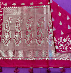 semi silk banarasi Saree in Rani Pink  with Gold  Zari Border.Fall peco done. Comess with stitched blouse size 38 can be altered up to 44