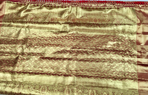 KSS513 Pure kanchipuram tissue silk Saree in gold color with orange gold zari border. comes with stitched blouse size 40,can be altered to 44 size.