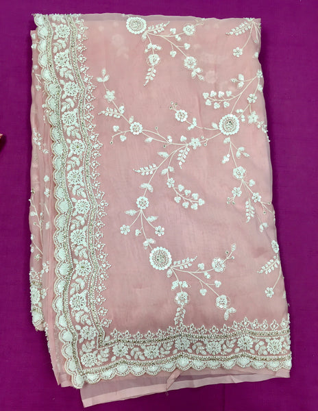 AFL3041 Partywear saree in light pink organza saree with white bead and sequin embroidery work.comes with stitched blouse size 40,can be altered to 44 size.Fall peco done.