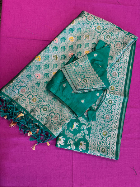 semi silk banarasi Saree in Green with Zari Border. Comes with stitched blouse size 38 can be altered up to 44
