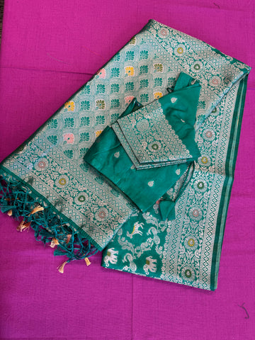 semi silk banarasi Saree in Green with Zari Border. Comes with stitched blouse size 38 can be altered up to 44