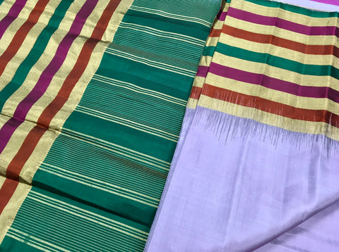 KSS414 Pure handloom kanchipuram silk Saree in purple with multi color gold zari border.comes with stitched blouse size 40,can be altered to 44 size.