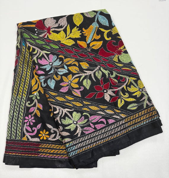 KSN204: Semi Silk Kantha Tusser Saree in black hand work design. Fall Peco done. Comes with stitched Blouse size 38 it can be altered to 44 size.