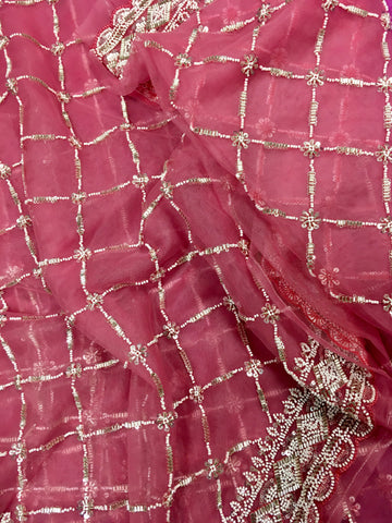 AFL3070 Partywear net saree in pink with silver bead and sequin embroidery.Comes with stitched blouse size 40,can be altered to 44 size.Fall peco done.