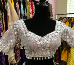 AFL4003 Wedding lehenga in lavender with heavy embroidery and sequin work.comes with stitched blouse and net dupatta.