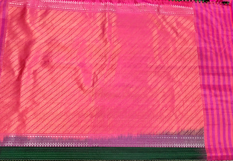KSS460 Pure handloom kanchipuram silk Saree in green with pink gold zari border.comes with stitched blouse size 40,can be altered to 44 size.