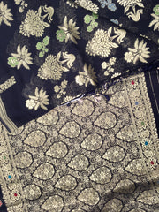 BKS106 Banarasi Georgette saree in black. Comes with stitched blouse size 38 can be altered to size 42. Fall peco done.