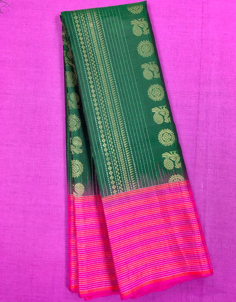 KSS460 Pure handloom kanchipuram silk Saree in green with pink gold zari border.comes with stitched blouse size 40,can be altered to 44 size.