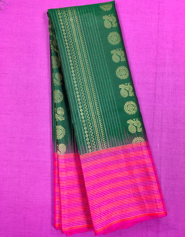 KSS460 Pure handloom kanchipuram silk Saree in green with pink gold zari border.comes with stitched blouse size 40,can be altered to 44 size.