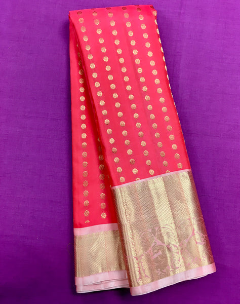 KSS455 Pure handloom kanchipuram silk Saree in red with light pink gold zari border.comes with stitched blouse size 40,can be altered to 44 size.