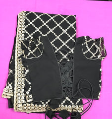 AFL3067 Partywear saree in black Georgette fabric with silver sequins embroidery.Come with stitched blouse size 40,can be altered to 44 size.Fall peco done.