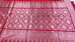 BKS128 Banarasi Mashru silk Saree in red. Comes with silver zari work. Comes with stitched blouse size 38 can be altered to size 42. Fall peco done.