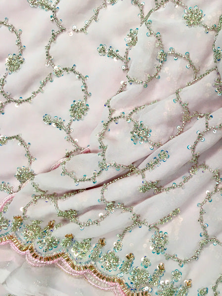 AFL3059 Partywear Saree in pink with sequins and bead work.Comes with stitched blouse size 40,can be altered to44 size.Fall peco done.