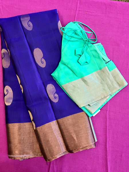 Pure kanchipuram Handloom Soft  Silk Saree in Blue with green  Zari border. Comess with Stitched Blouse size 38 can be altered up to 44