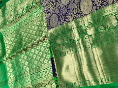KSS507 Pure kanchipuram handloom silk Saree in purple with green color gold zari border. comes with stitched blouse size 40,can be altered to 44 size.