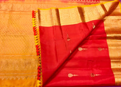KSS410 Pure handloom kanchipuram silk Saree in Orange with yellow gold zari border.comes with stitched blouse size 40,can be altered to 44 size.