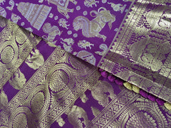 KSS516 - Pure kanchipuram handloom silk Saree in purple with gold zari border. Comes with stitched blouse size.