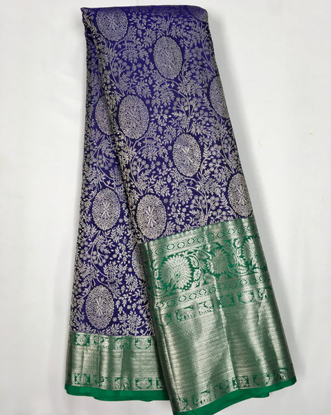 KSS507 Pure kanchipuram handloom silk Saree in purple with green color gold zari border. comes with stitched blouse size 40,can be altered to 44 size.