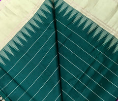 KSS425 Pure handloom kanchipuram silk Saree in bottle green with gold zari border.comes with stitched blouse size 40,can be altered to 44 size.