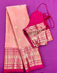 KSS453 Pure handloom kanchipuram silk Saree in pink with Rani pink gold zari border.comes with stitched blouse size 40,can be altered to 44 size.