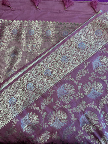 Banarasi Tussari georgette saree in Onion Pink with gold and silver zari border.Fall peco done. Comess with stitched blouse size 38 can be altered up to 44 size.