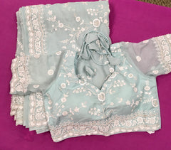 AFL3042 Partywear saree in light blue organza saree with white bead and sequin embroidery.Comes with stitched blouse size 40,can be altered to 44 size.Fall peco done.