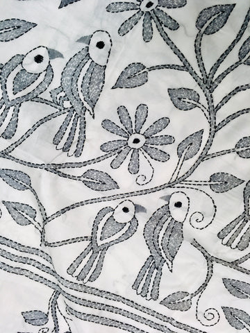 KSN211 Semi Silk Kantha Tusser Saree in white hand work design. Comes with stitched Blouse.