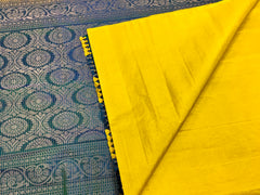 KSS426 Pure handloom kanchipuram silk Saree in green with blue gold zari border. Comes with stitched blouse size 40