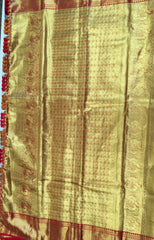 KSS510 Pure kanchipuram tissue silk Saree in orange with gold zari work.comes with stitched blouse size 40,can be altered to 44 size.
